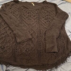 Free people, black sweater, distressed, looking size large